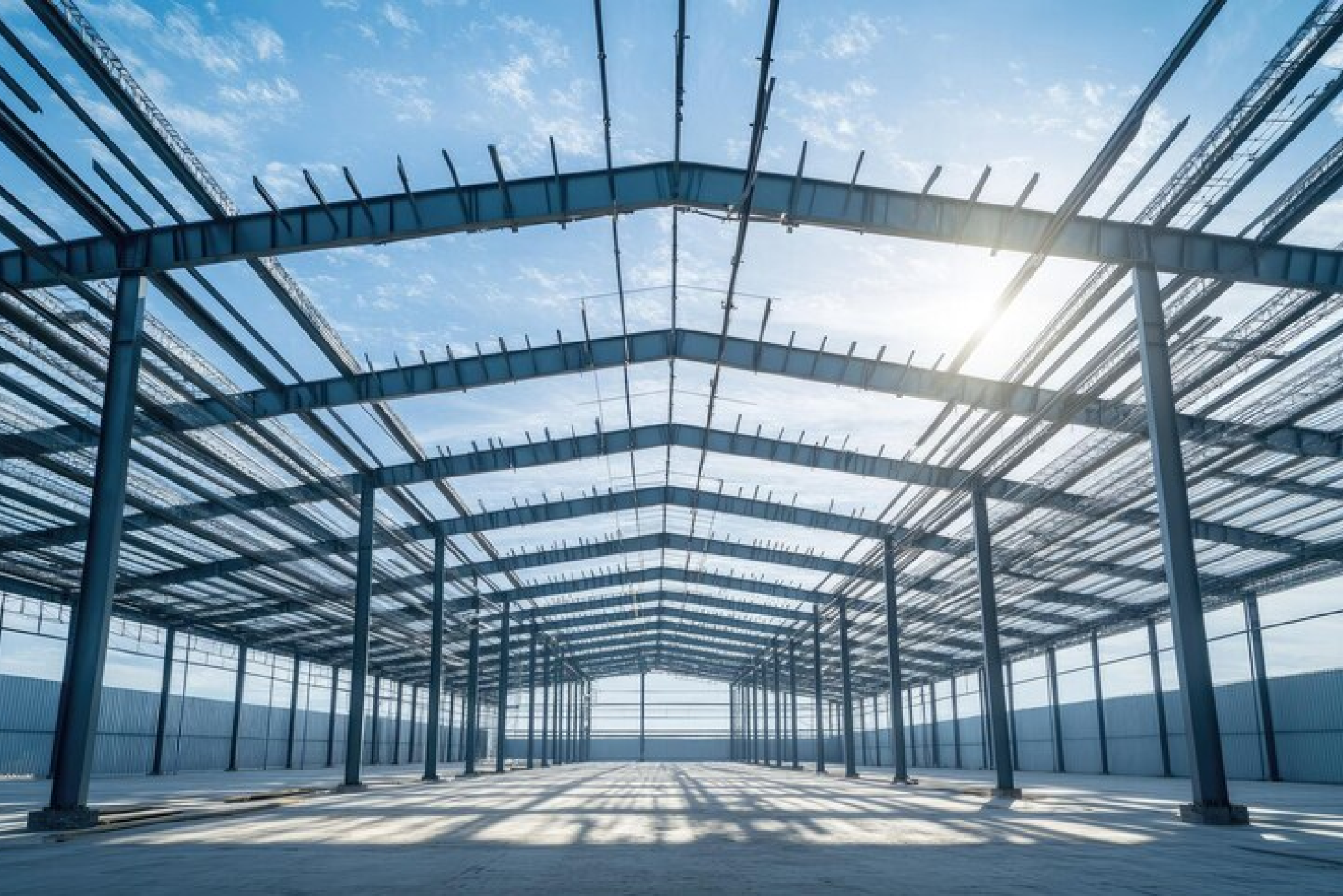 Steel truss girder rooftop construction